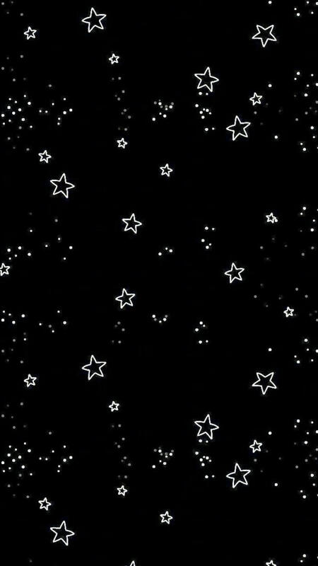 A black background with white stars of varying sizes.